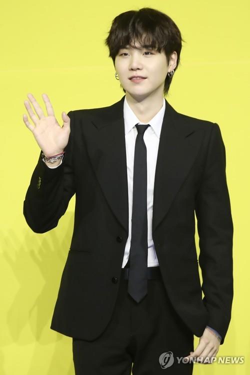 BTS member Suga poses during a news conference for the group's new digital single "Butter" in eastern Seoul on May 21, 2021. (Yonhap)