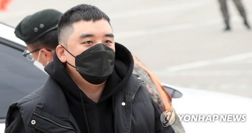 This March 9, 2020, file photo shows Seungri, the disgraced former member of K-pop boy band BIGBANG, entering an Army training camp in Cheorwon, about 90 kilometers northeast of Seoul. (Yonhap)