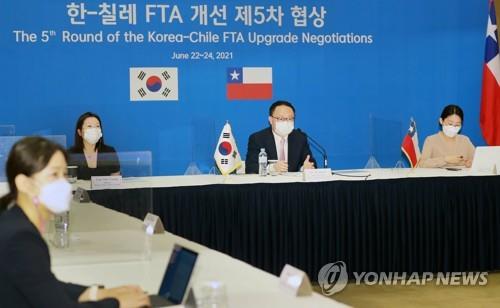 This file photo, taken and provided by Seoul's trade ministry on June 22, 2021, shows South Korean officials holding their fifth round of talks with their Chilean counterparts via teleconferencing to improve their bilateral free trade agreement (FTA). (PHOTO NOT FOR SALE) (Yonhap)