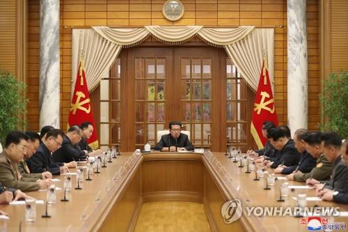 North Korean leader Kim Jong-un (C) convenes a politburo meeting of the country's ruling Worker's Party in Pyongyang on Dec. 1, 2021, in this photo released by the North's official Korean Central News Agency the next day. (For Use Only in the Republic of Korea. No Redistribution) (Yonhap)