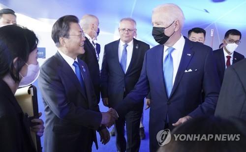 Biden may talk by phone with ex-President Moon while in S. Korea