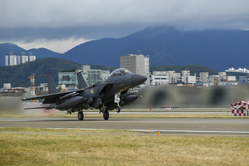 An F-15K fighter takes off to engage in air drills with the U.S. military on Oct. 4, 2022, in this photo provided by South Korea's Joint Chiefs of Staff. (PHOTO NOT FOR SALE) (Yonhap)