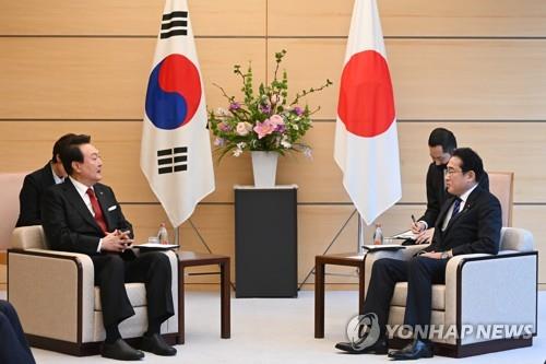 Opposition party denounces Yoon-Kishida summit as 'shameful submission to Japan'