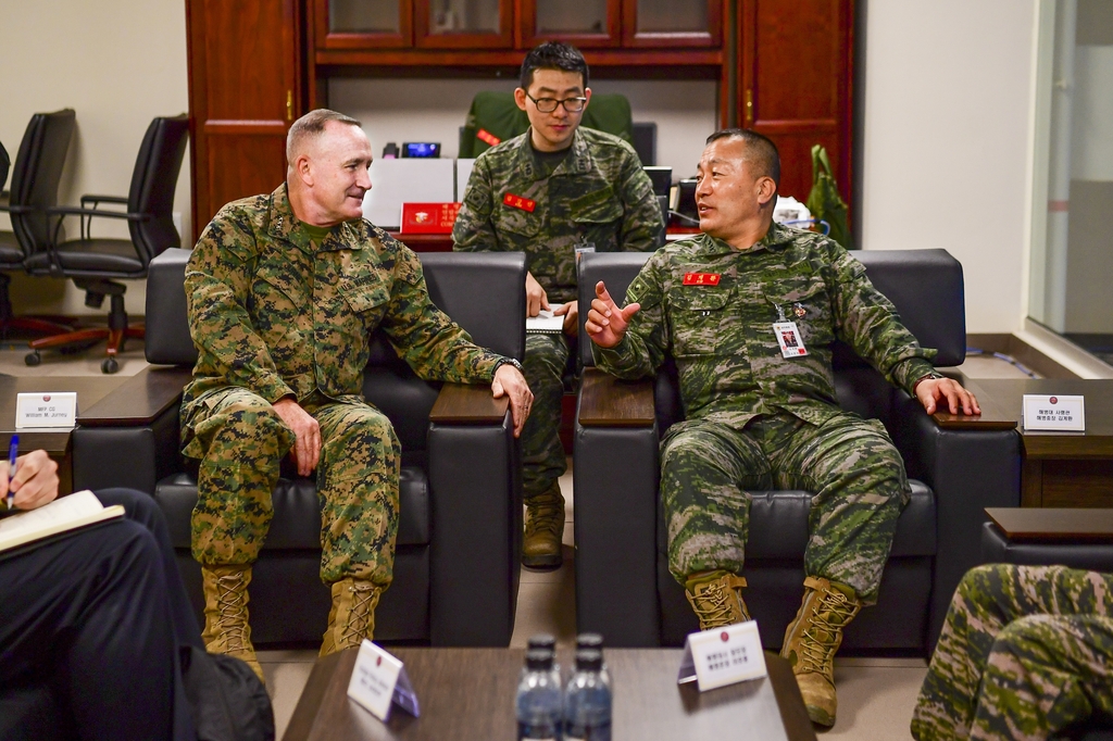 South Korean Marine Corps Commandant Lt. Gen. Kim Gye-hwan (R) speaks with Lt. Gen. William M. Jurney, commander of the U.S. Marine Corps Forces, Pacific, during their talks at Camp Mujuk in Pohang, 272 kilometers southeast of Seoul, on March 22, 2023, in this photo released by the South Korean Marine Corps. (PHOTO NOT FOR SALE) (Yonhap) 