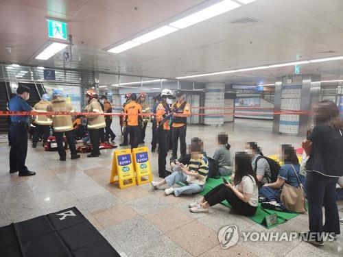 This photo provided by the fire agency shows an accident scene at Sunae Station on June 8, 2023. (PHOTO NOT FOR SALE) (Yonhap)
