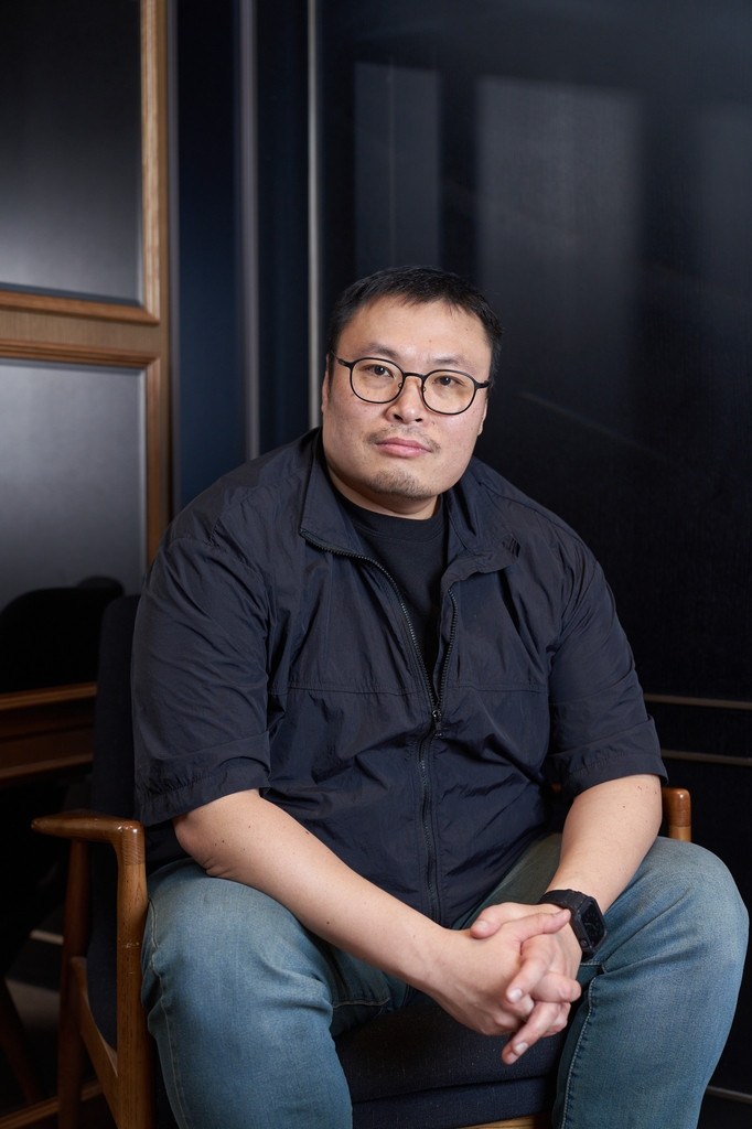 Kang Full, the creator of webtoon "Moving" and a screenwriter for its live-action series under the same title, is seen in this photo provided by The Walt Disney Company Korea. (PHOTO NOT FOR SALE) (Yonhap)