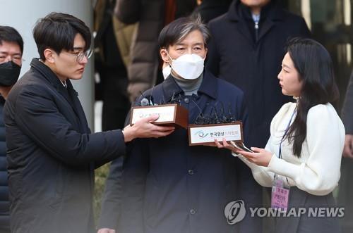 Former Justice Minister Cho Kuk (C) talks to reporters at the Seoul Central District Court in southern Seoul in this file photo taken Feb. 3, 2023. (Yonhap)