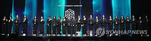 K-pop girl group tripleS poses for photographers during a media showcase at a concert hall in Seoul on May 8, 2024, for its first full-length album, "Assemble24." (Yonhap)