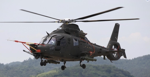 This photo provided by the Korea Aerospace Industries shows a prototype of the Light Armed Helicopter conducting a test flight. (PHOTO NOT FOR SALE) (Yonhap)