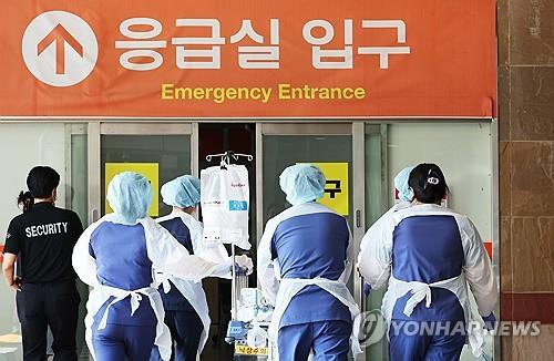 Medical staff members move at Ajou University Hospital in Suwon on Sept. 4, 2024. (Yonhap)