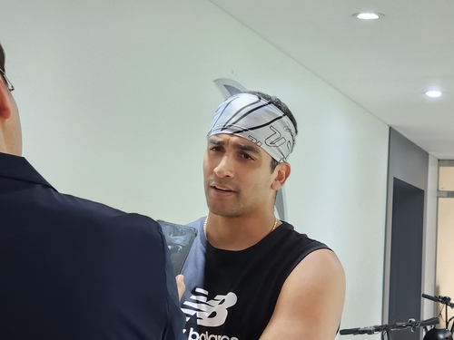KT Wiz starter William Cuevas speaks with Yonhap News Agency at KT Wiz Park in Suwon, Gyeonggi Province, on Oct. 8, 2024, before a Korea Baseball Organization postseason game against the LG Twins. (Yonhap)