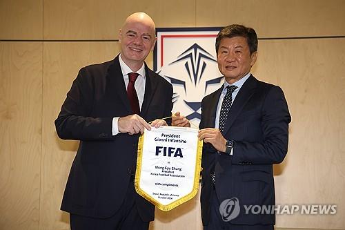 FIFA President Gianni Infantino (L) and Korea Football Association (KFA) President Chung Mong-gyu pose for a photo after their meeting at the KFA headquarters in Seoul on Oct. 28, 2024, in this photo provided by the KFA. (PHOTO NOT FOR SALE) (Yonhap)