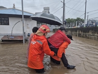 (3rd LD) 2 dead, about 1,000 evacuated as torrential rains hit central regions