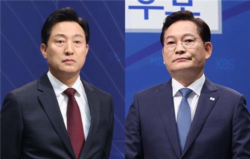 ソウル市長選候補の呉氏（左）と宋氏（国会写真記者団）＝（聯合ニュース）