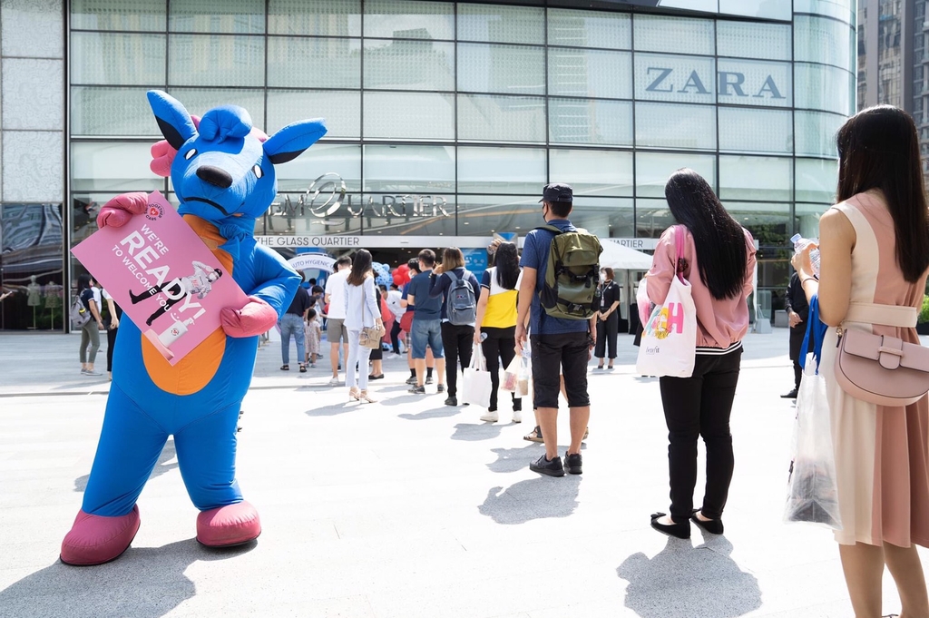 The Mall Group employees and clients are seen wearing face masks and implementing other strict safety measures in Bangkok as Siam Paragon, Emporium, and Emquartier, reopened their doors to shoppers this Sunday May 17 as a relaxation of the lockdown.