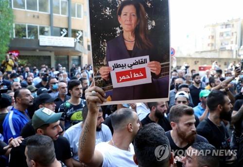 주레바논 미국대사 사진을 들고 시위를 벌이는 헤즈볼라 지지자들