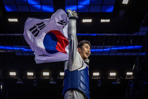 남자 87㎏초과급에서 우승한 후 세리머니 하는 강상현.