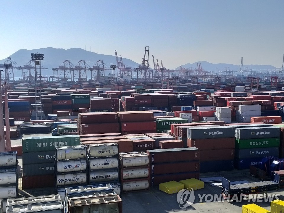 This undated photo shows containers carrying export goods in Busan, South Korea's largest seaport. (Yonhap)