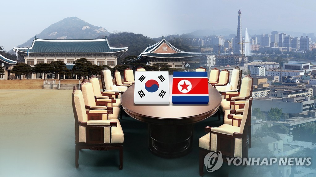 This undated composite image, provided by Yonhap News TV, shows the flags of South Korea (L) and North Korea. (PHOTO NOT FOR SALE) (Yonhap)