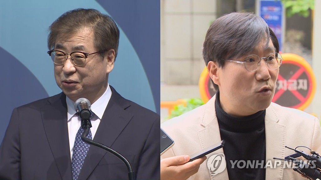 This image, captured from footage by Yonhap News TV, shows Suh Hoon (L), chief of the National Intelligence Service, and Yang Jeong-cheol, director of the ruling Democratic Party's think tank. (Yonhap)