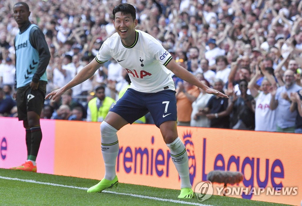 In this EPA photo, Son Heung-min of Tottenham Hotspur celebrates after setting up a goal by Eric Dier against Southampton during the clubs' Premier League match at Tottenham Hotspur Stadium in London on Aug. 6, 2022. (Yonhap)