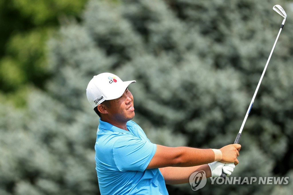In this Getty Images file photo from July 16, 2022, An Byeong-hun of South Korea tees off on the 17th hole during the third round of the Memorial Health Championship on the Korn Ferry Tour at Panther Creek Country Club in Springfield, Illinois. (Yonhap)