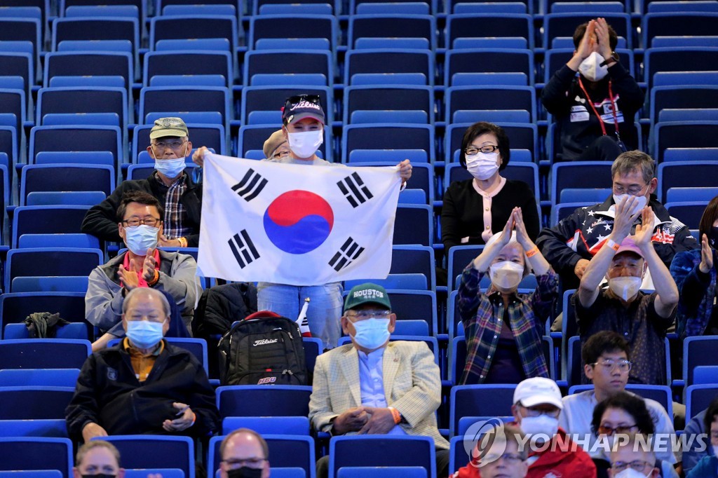 In this USA Today Sports photo via Reuters, fans cheer on South Korean players during the World Table Tennis Championships at George R. Brown Convention Center in Houston, Texas, on Nov. 24, 2021. (Yonhap)