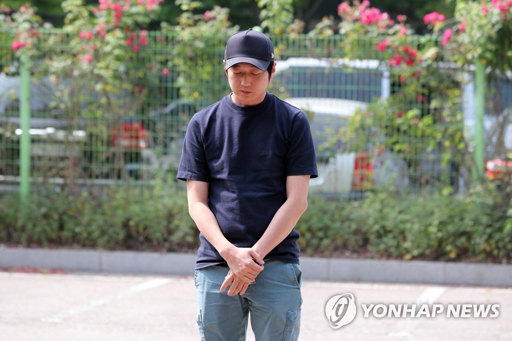 This file photo taken June 18, 2018, shows former South Korean national short track speed skating team coach Cho Jae-bum at a police station in Suwon, south of Seoul. (Yonhap)