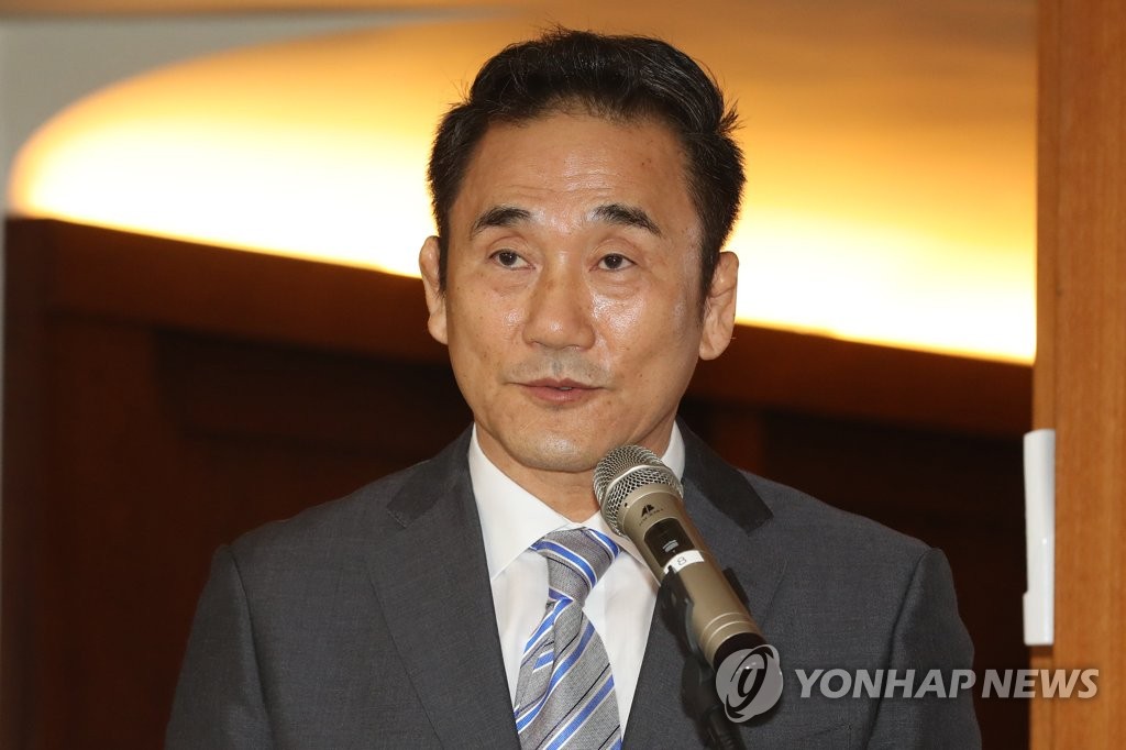 In this file photo from July 6, 2018, Kim Kyung-doo, former vice president of the Korean Curling Federation (KCF), speaks at a tourism networking event in Seoul. (Yonhap)