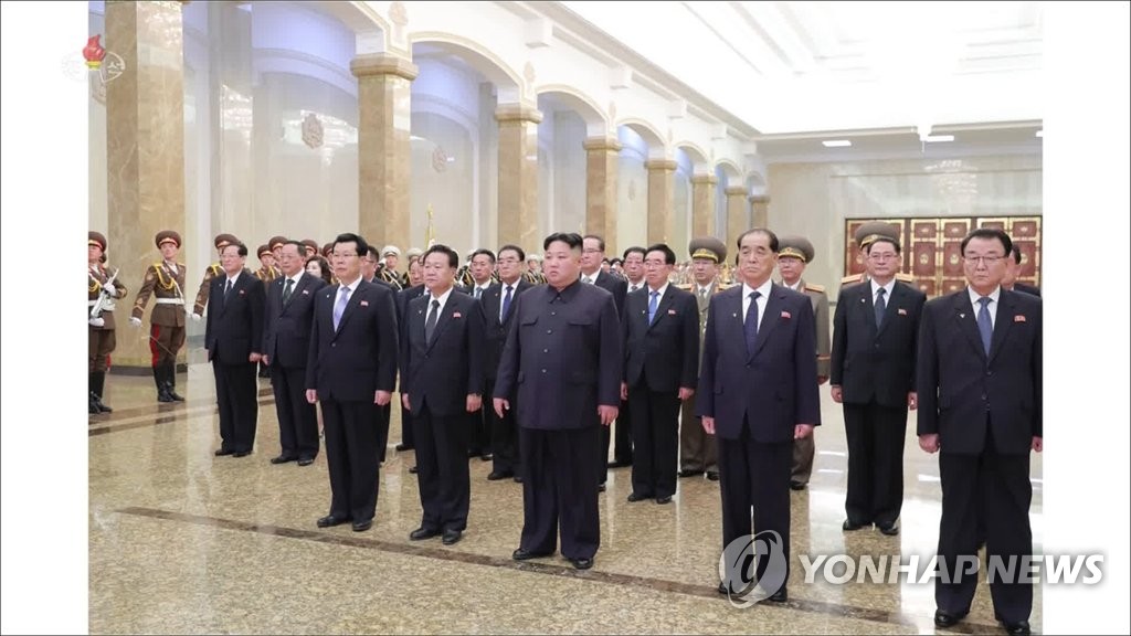 In this image captured from the Korean Central TV Broadcasting Station on April 15, 2019, North Korean leader Kim Jong-un (C) and other top officials visit the Kumsusan Palace of the Sun in Pyongyang to mark the birth anniversary of North Korea's late founder and his grandfather Kim Il-song. The bodies of the founder and his father Kim Jong-il lie in state in the mausoleum. (For Use Only in the Republic of Korea. No Redistribution) (Yonhap)