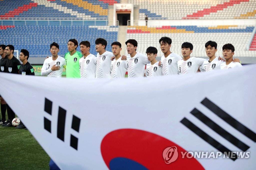 In this photo, provided by the Korea Football Association, the starting players for South Korea in a World Cup qualifying match against North Korea stand for their national anthem at Kim Il-sung Stadium in Pyongyang on Oct. 15, 2019. (PHOTO NOT FOR SALE) (Yonhap)