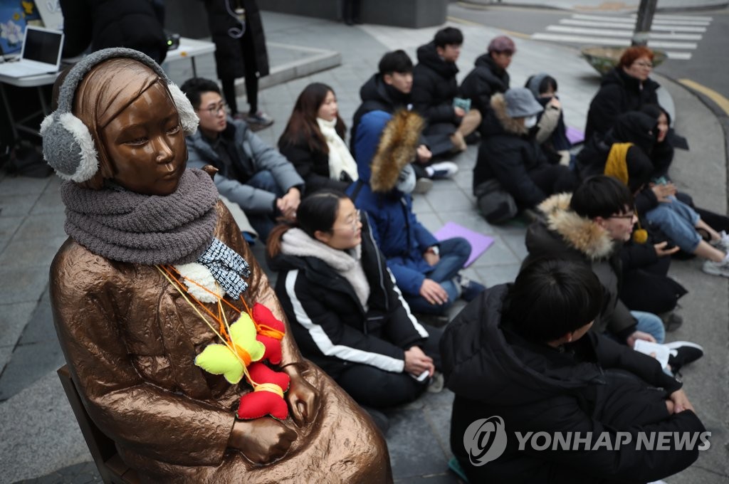This photo, taken on Dec. 29, 2019, shows a bronze statue of a girl symbolizing Korean victims of sexual slavery that was installed in 2011 to mark the 1,000th round of the weekly rally held every Wednesday to protest against Japan's sexual slavery of Korean women during World War II. (Yonhap)