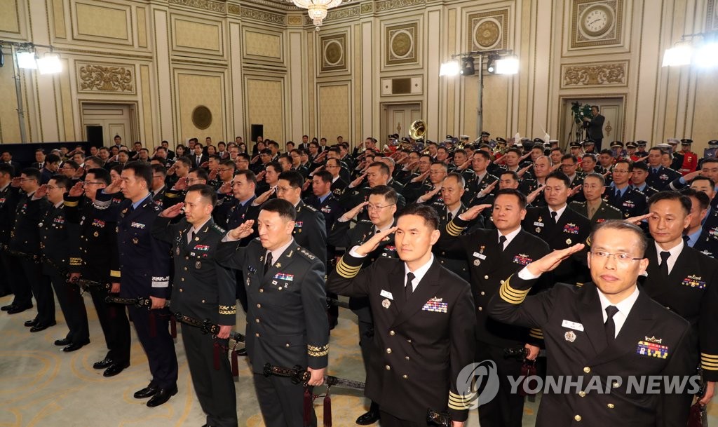 Newly promoted one-star generals salute President Moon Jae-in during a Cheong Wa Dae ceremony on Jan. 29, 2020. (Yonhap)