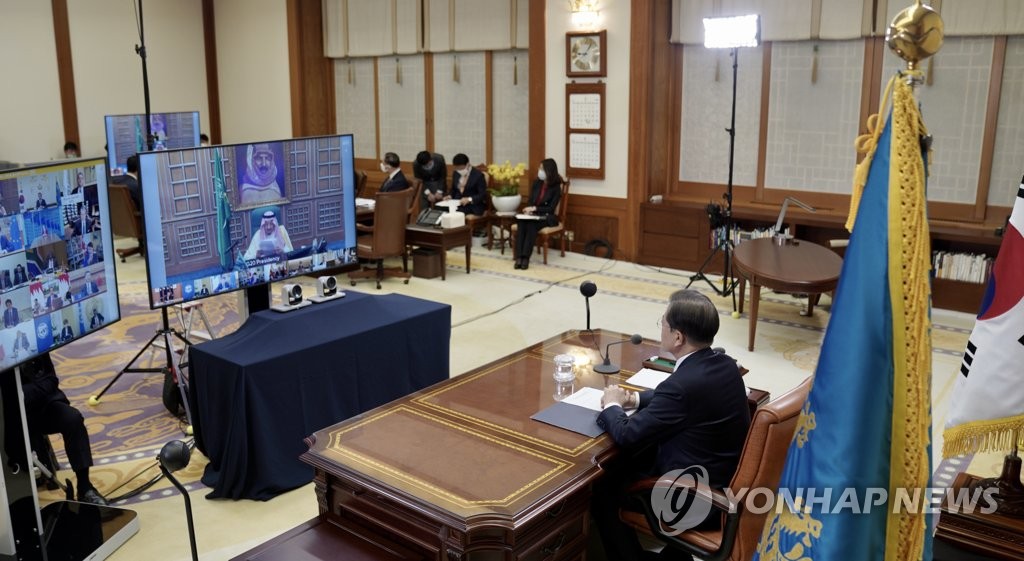 South Korean President Moon Jae-in takes part in a G-20 teleconference at his office in Seoul on March 26, 2020, in this photo provided by Cheong Wa Dae. (PHOTO NOT FOR SALE) (Yonhap) 