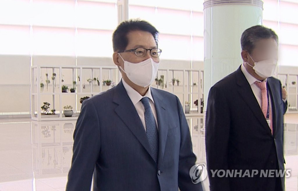 Park Jie-won (L), head of South Korea's National Intelligence Service, arrives at Incheon International Airport, west of Seoul, on May 11, 2021, to head for Japan to attend a meeting with his U.S. and Japanese counterparts, in this photo captured from Yonhap News TV. (PHOTO NOT FOR SALE) (Yonhap)