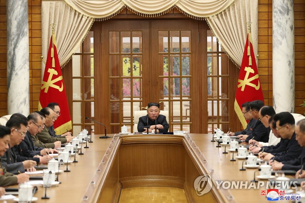 This photo released by North Korea's official Korean Central News Agency on June 5, 2021, shows leader Kim Jong-un (C) presiding over a politburo session of the Workers' Party in Pyongyang the previous day, in his first public appearance in a month. (For Use Only in the Republic of Korea. No Redistribution) (Yonhap)