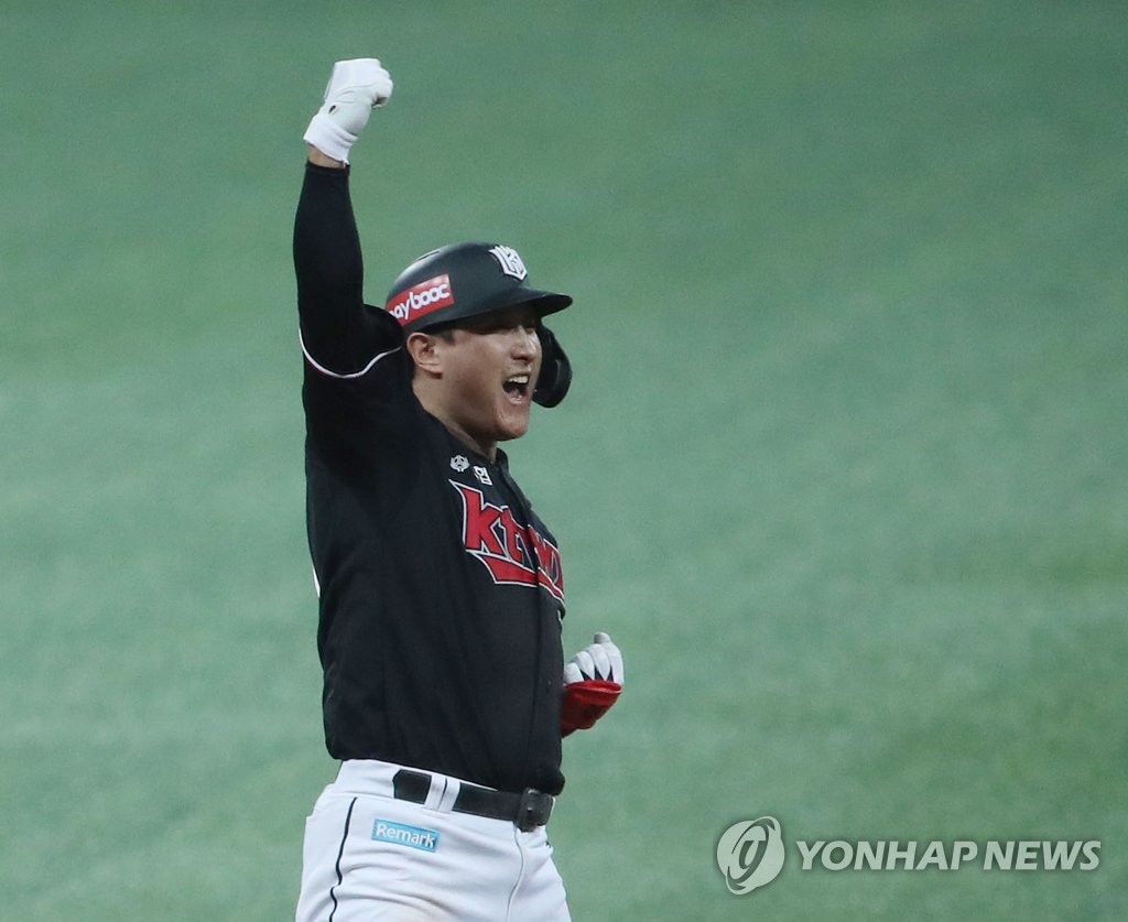 In this file photo from Nov. 18, 2021, Hwang Jae-gyun of the KT Wiz celebrates his RBI double against the Doosan Bears in the top of the second inning during Game 4 of the Korean Series at Gocheok Sky Dome in Seoul. (Yonhap)