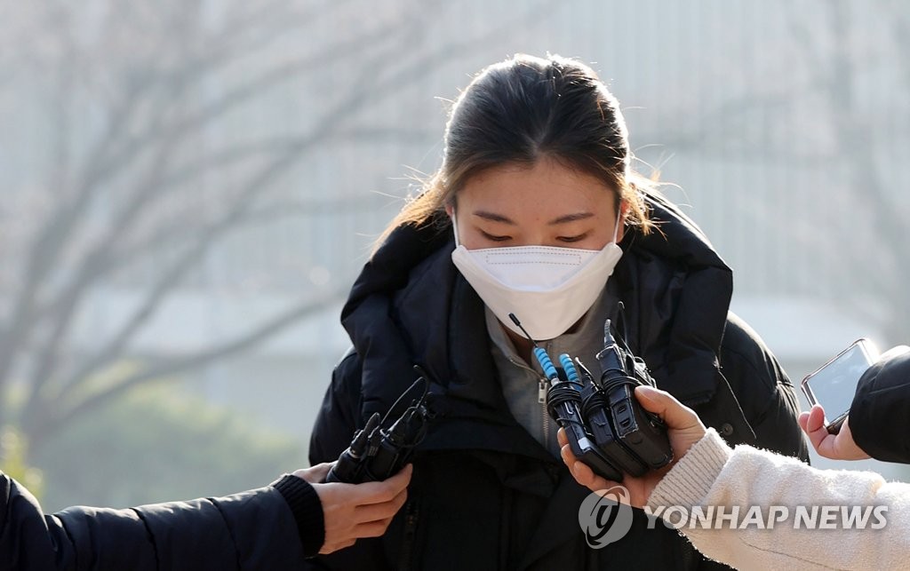 In this file photo from Dec. 21, 2021, South Korean short track speed skater Shim Suk-hee speaks to reporters before attending a disciplinary hearing by the Korea Skating Union (KSU) at the KSU's headquarters in Seoul. (Yonhap)