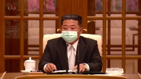  N. Korea says month-old virus crisis under control, but skepticism lingers
