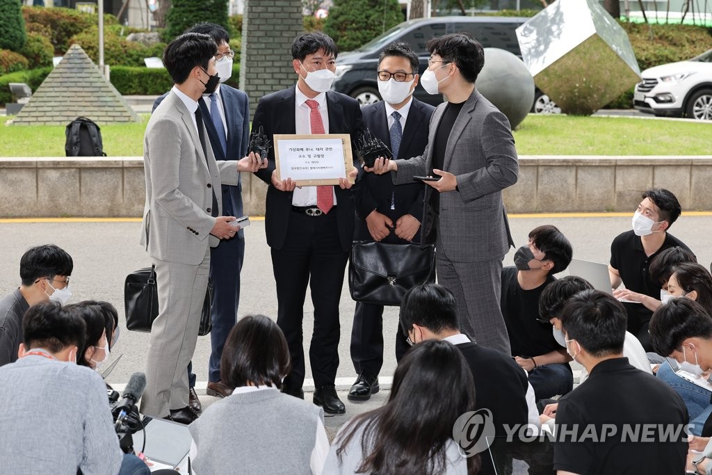 Lawyers from LKB & Partners representing South Korean investors in two main tokens of Terraform Labs hold a press conference at the Seoul Southern District Prosecutors Office on May 19, 2022. The investors have sued Do Kwon, the embattled cryptocurrency firm's co-founder and CEO, and co-founder Daniel Shin. (Yonhap) 