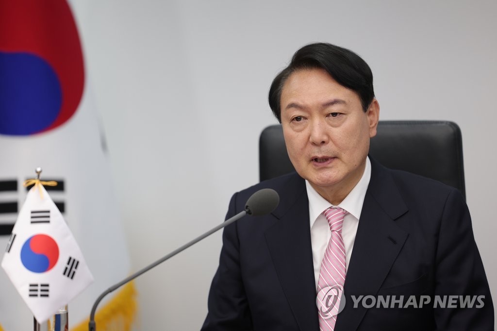 President Yoon Suk-yeol attends the Indo-Pacific Economic Framework for Prosperity launch event, held in Japan, via video link from his office in Seoul on May 23, 2022, in this photo released by the presidential office. (PHOTO NOT FOR SALE) (Yonhap)