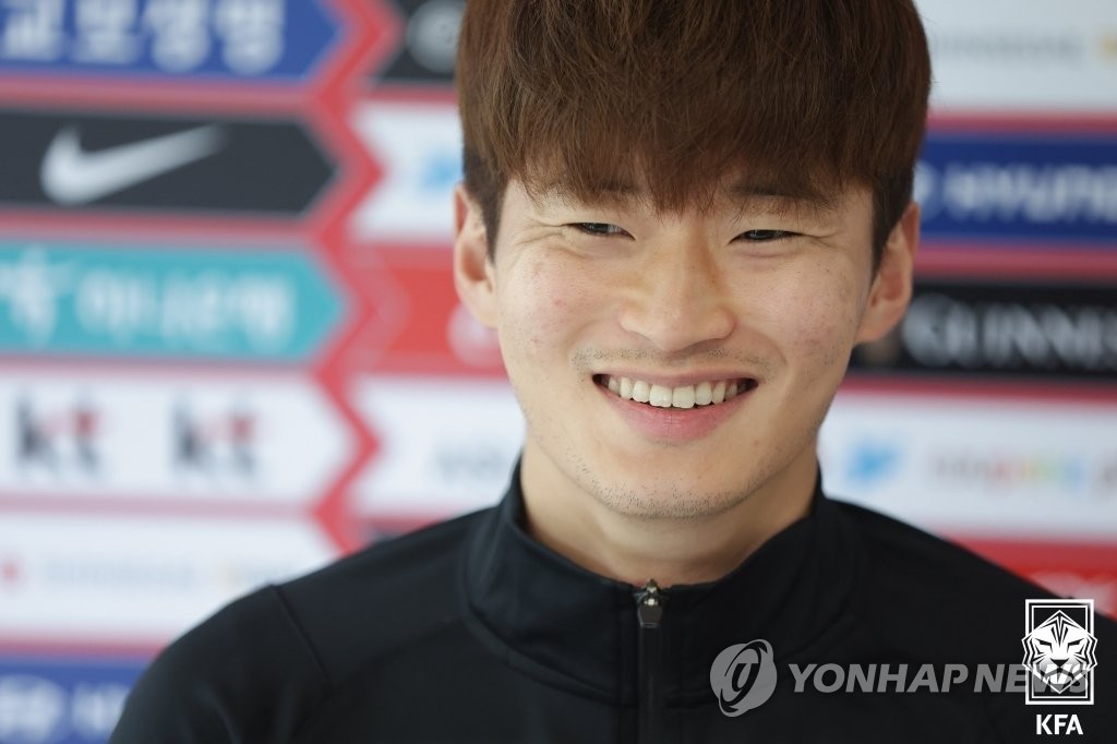 South Korean defender Kim Jin-su smiles during an online press conference at the National Football Center in Paju, Gyeonggi Province, on June 12, 2022, two days before South Korea's friendly match against Egypt, in this photo provided by the Korea Football Association. (PHOTO NOT FOR SALE) (Yonhap)