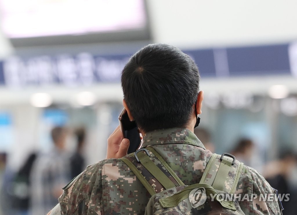 This file photo, taken June 17, 2022, shows a service member waiting for a train at Seoul Station in central Seoul. (Yonhap)