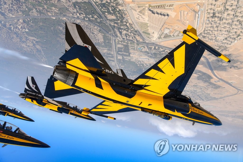 South Korea's Black Eagles aerobatic team stages a performance at the Pyramids Air Show 2022 in Giza, Egypt, in this photo released by the Air Force. (PHOTO NOT FOR SALE) (Yonhap)