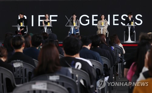Cast members of Netflix's new Korean original "Somebody" attend the Busan International Film Festival's "Open Talk" session held at the outdoor theater of the Busan Cinema Center in the southeastern port city on Oct. 6, 2022. (Yonhap)