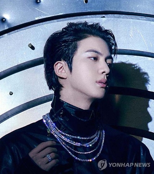 Jin, the oldest member of K-pop supergroup BTS, is seen in this photo taken from the band's website on Oct. 17, 2022. Big Hit Music, the band's agency, said all members of BTS will fulfill their mandatory military service, starting with Jin. (PHOTO NOT FOR SALE) (Yonhap)