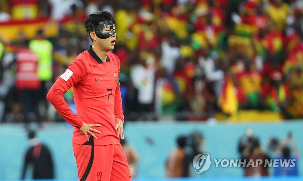 South Korean captain Son Heung-min reacts to a goal by Ghana during the countries' Group H match at the FIFA World Cup at Education City Stadium in Al Rayyan, west of Doha, on Nov. 28, 2022. (Yonhap)