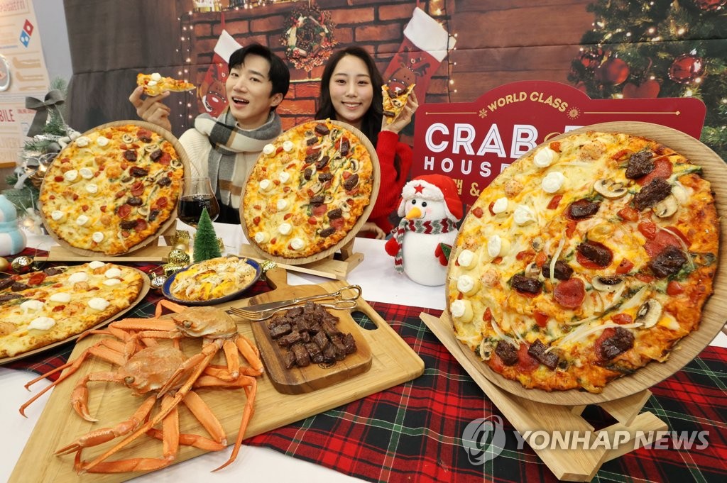 도미노피자, 한 판에 두 가지 맛 크랩&립 하우스 출시 | 연합뉴스