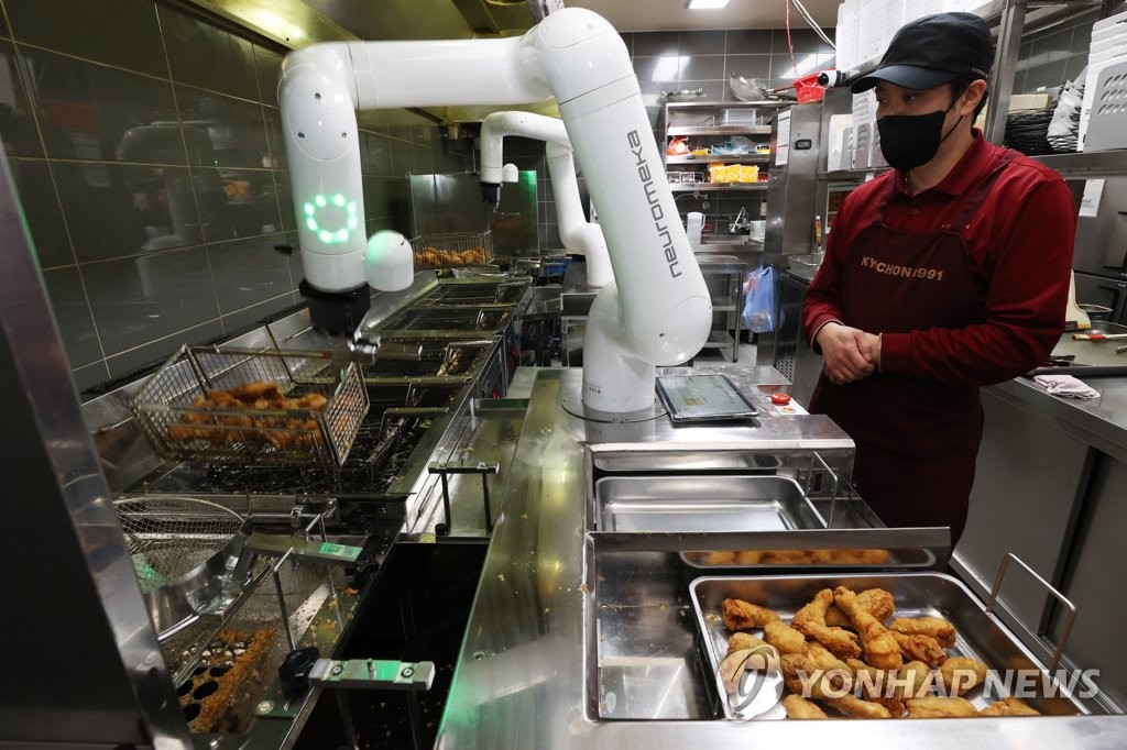 Robot para preparar pollo frito