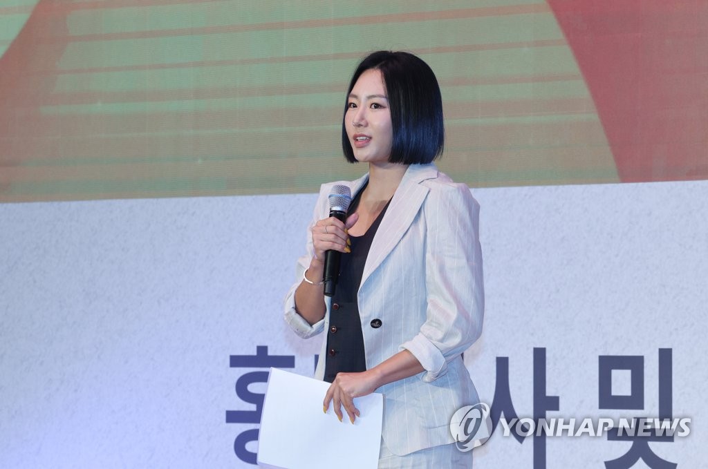 Lee Sang-hwa, co-president of the organizing committee for the 2024 Gangwon Winter Youth Olympics, speaks during a ceremony introducing new honorary ambassadors in Seoul on March 24, 2023. (Yonhap)